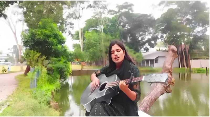 এক হাতে গিটার, অন্য হাতে সমাজ বদলের স্বপ্ন এক হাতে গিটার, অন্য হাতে সমাজ বদলের স্বপ্ন